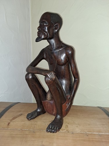 Afrikanische sitzende figur - afrikanische,